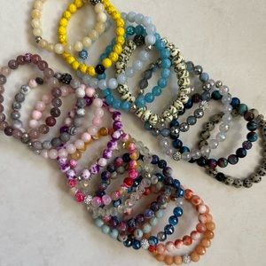 Crystal and natural gemstones bracelets. All ranging in color.